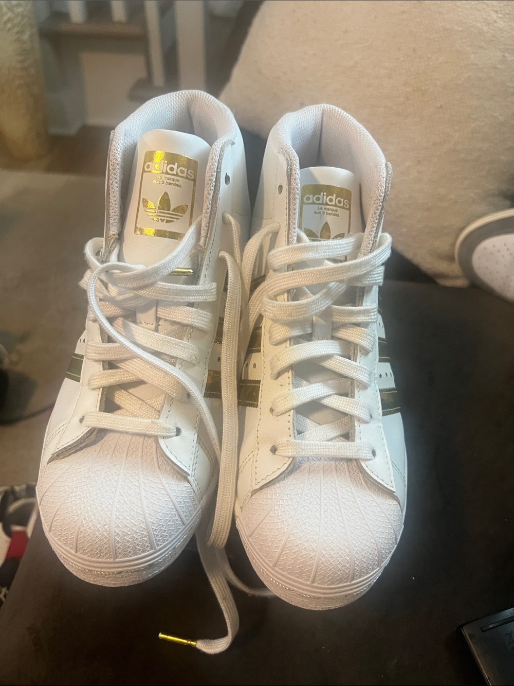 adidas White Sneakers with Gold Accents